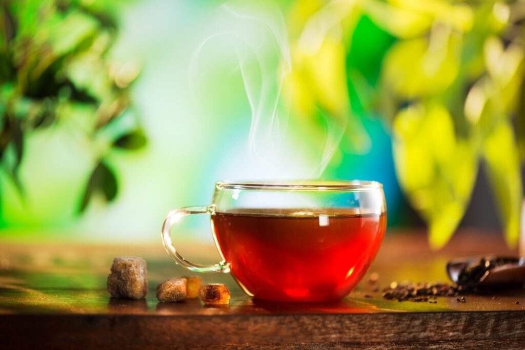 A steamy cup of tea in a clear mug