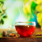 A steamy cup of tea in a clear mug
