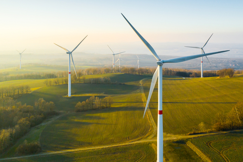 A wind farm in the fog
