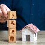 Stacked blocks with icons for energy, water, heat and waste